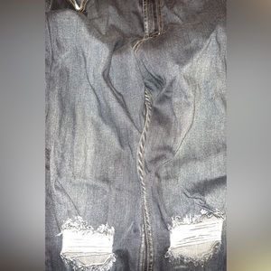 Dark wash jeans with knee detail